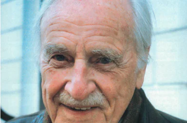 Close-up portrait of Geoffrey Farthing smiling, representing historical proposals for the theosophical movement.